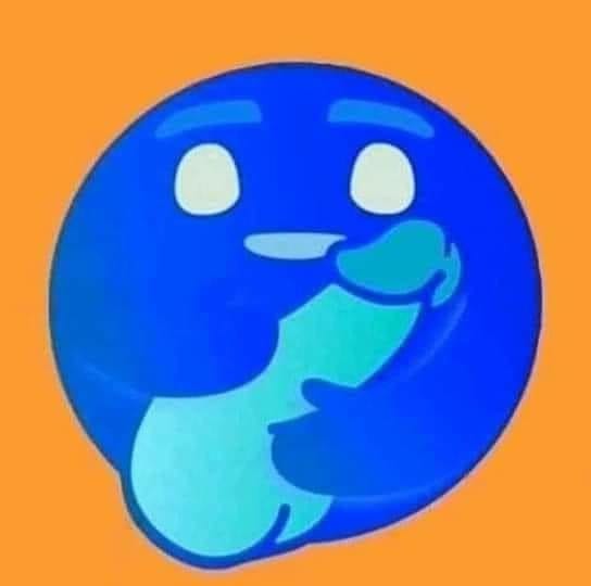 The meme is a blue, circular character with a simple, emotive face, often used to express excitement or enthusiasm. The text "This is fine" is often displayed above or below the character, implying that everything is okay despite a catastrophic or chaotic situation. The meme is often used to convey a sense of irony or dry humor in response to a situation that's actually pretty bad.